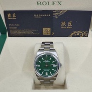 Rolex  124300 green Oyster perpetual