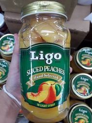 ลูกพีชในน้ำเชื่อม พีชในน้ำเชื่อม พีช 680กรัม ลิโก้ Ligo Sliced Peaches Hand Selected in Light Syrup