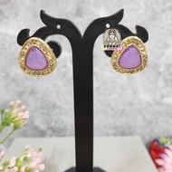 Stud earring with big stone and shining white stone