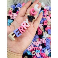 25 grams of mixed letter beads with 3mm diameter holes