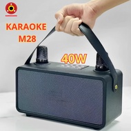 Loa Bluetooth M28 Nghe Nhạc Hát Karaoke Xách Tay Kèm 2 Mic Không Dây Công Suất Lớn Kết Nối Đa Dạng