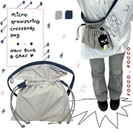 micro drawstring crossbody bag