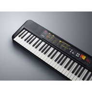 Yamaha F52 keyboard with adapter and book stand