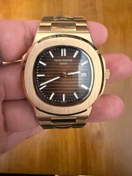 Patek Philippe Nautilus 5711/1R-001 - Rose Gold / Brown Dial