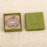 義大利奢侈時裝品牌Gucci彩鑽花朵鏤空雙層鏈條手鍊 代購服務
