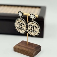 CHANEL - 金色圓形菱格皮穿鍊耳環