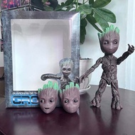หุ่นการ์เดียนส์ของกาแล็คซี่ของขวัญสำหรับเพื่อนโมเดลหุ่นแอ็กชันขยับได้สำหรับชายต้นไม้ Groot
