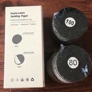 Abrasive pad box for heel tea machine