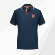 เสื้อโปโลชายถักแขนสั้นคอปกแขนสั้นสีสันสดใสสำหรับเล่นฟุตบอลของทีม Arsenal เสื้อผ้ากีฬาที่สวมใส่สบายสำ