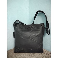 Tumi Leather Sling Bag