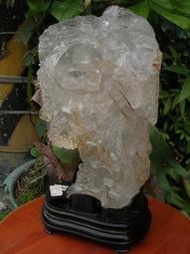 巴西天然帶皮白水晶雕(招財元寶財神)重5500g特價出清