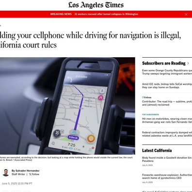 California Court Rules Holding Phone for Navigation While Driving is Illegal, Sparking Debate Over Car Touchscreens